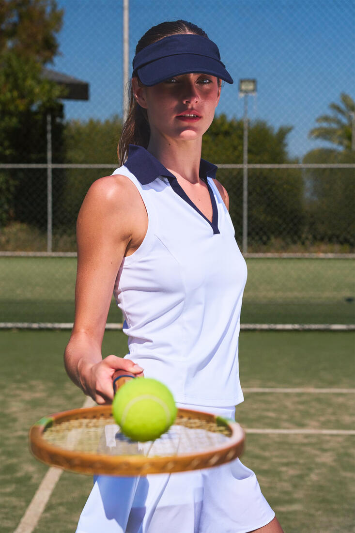 Guest holding a tennis racket and ball at Side Aluna Hotel