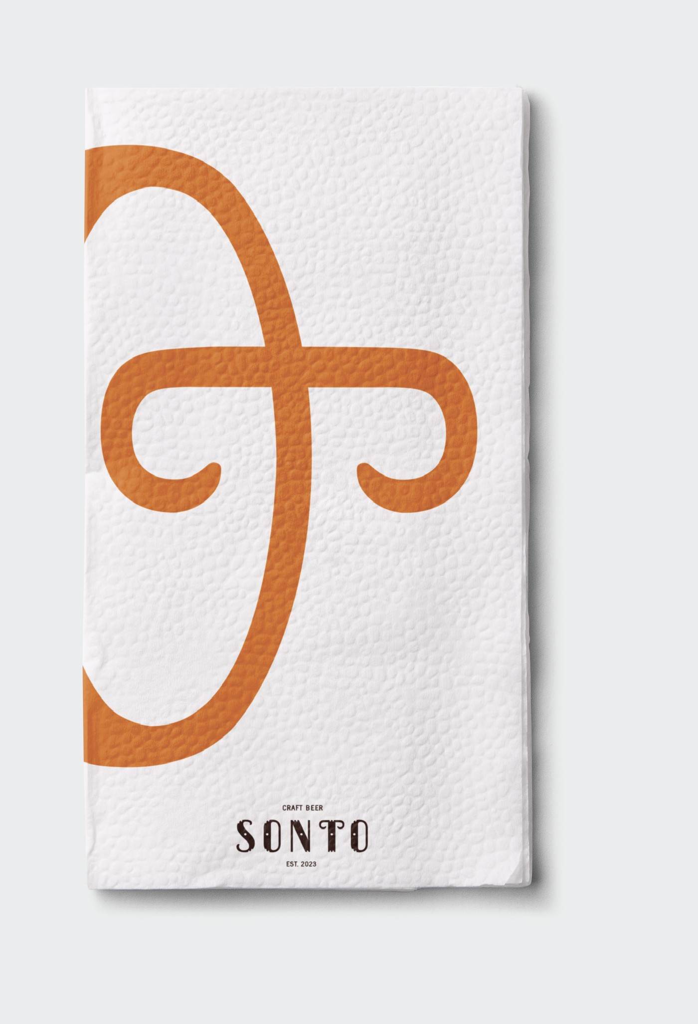 Sonto Beer napkin mockup — logo design